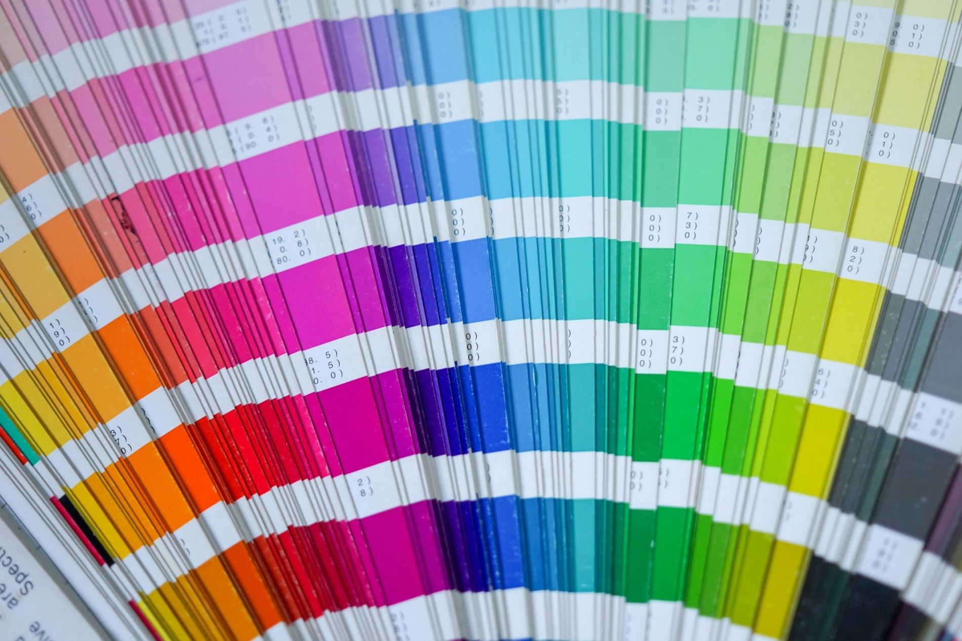A fanned colour book, every printing ink laid open at once