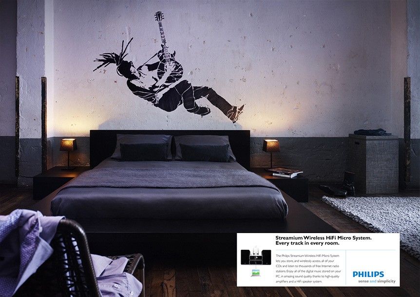 Gitarist in een verlichte kamer, campagnebeeld voor Philips Streamium, fotografie Edo Kars
