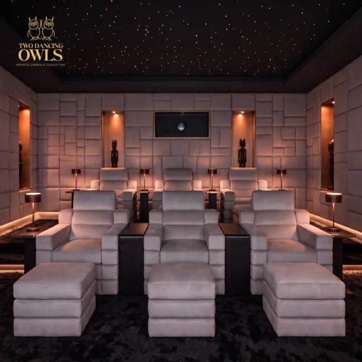 Six seat private cinema in pale grey velvet with a star ceiling