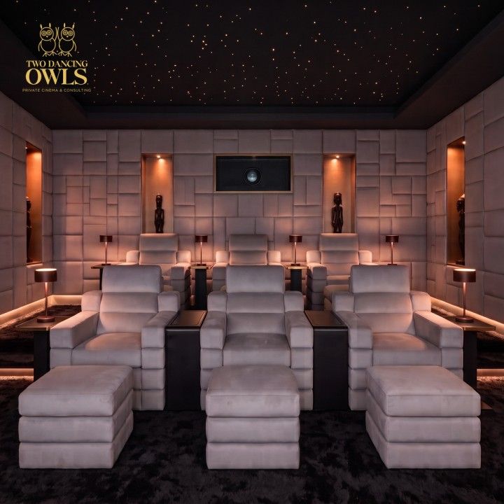 Six seat private cinema in pale grey velvet with a star ceiling
