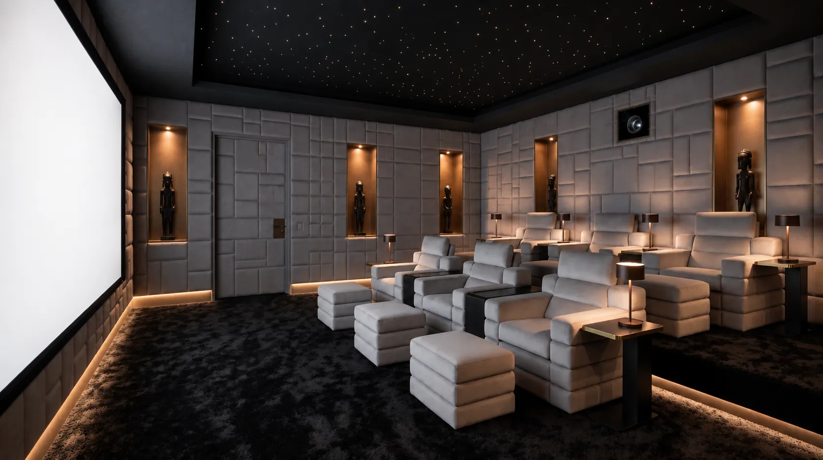 Private cinema in pale grey velvet with a star ceiling and African sculptures in lit niches